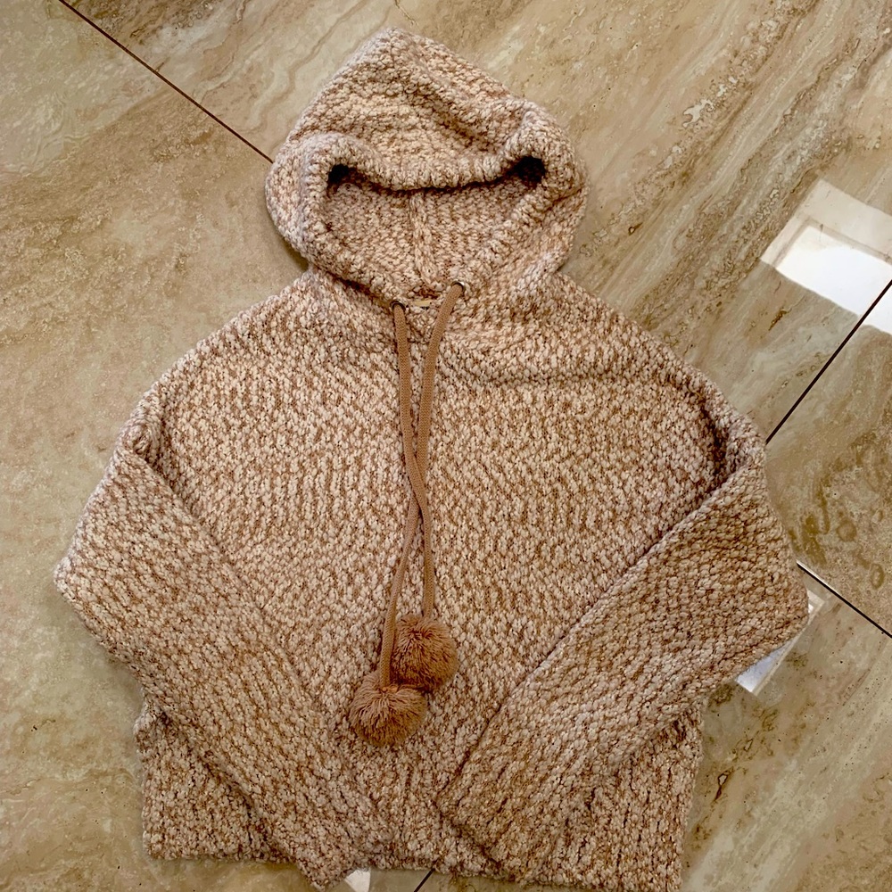 Hooded sweater.